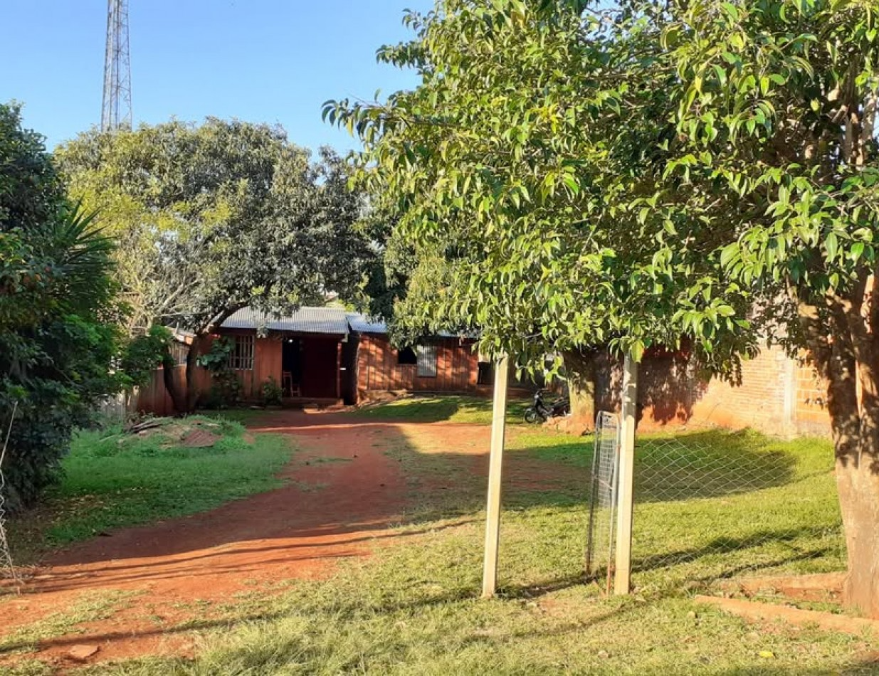 Terreno con casa precaria